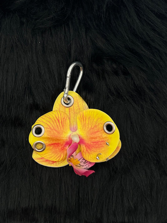 Yellow Pierced Orchid Keychain With Silver Hardware
