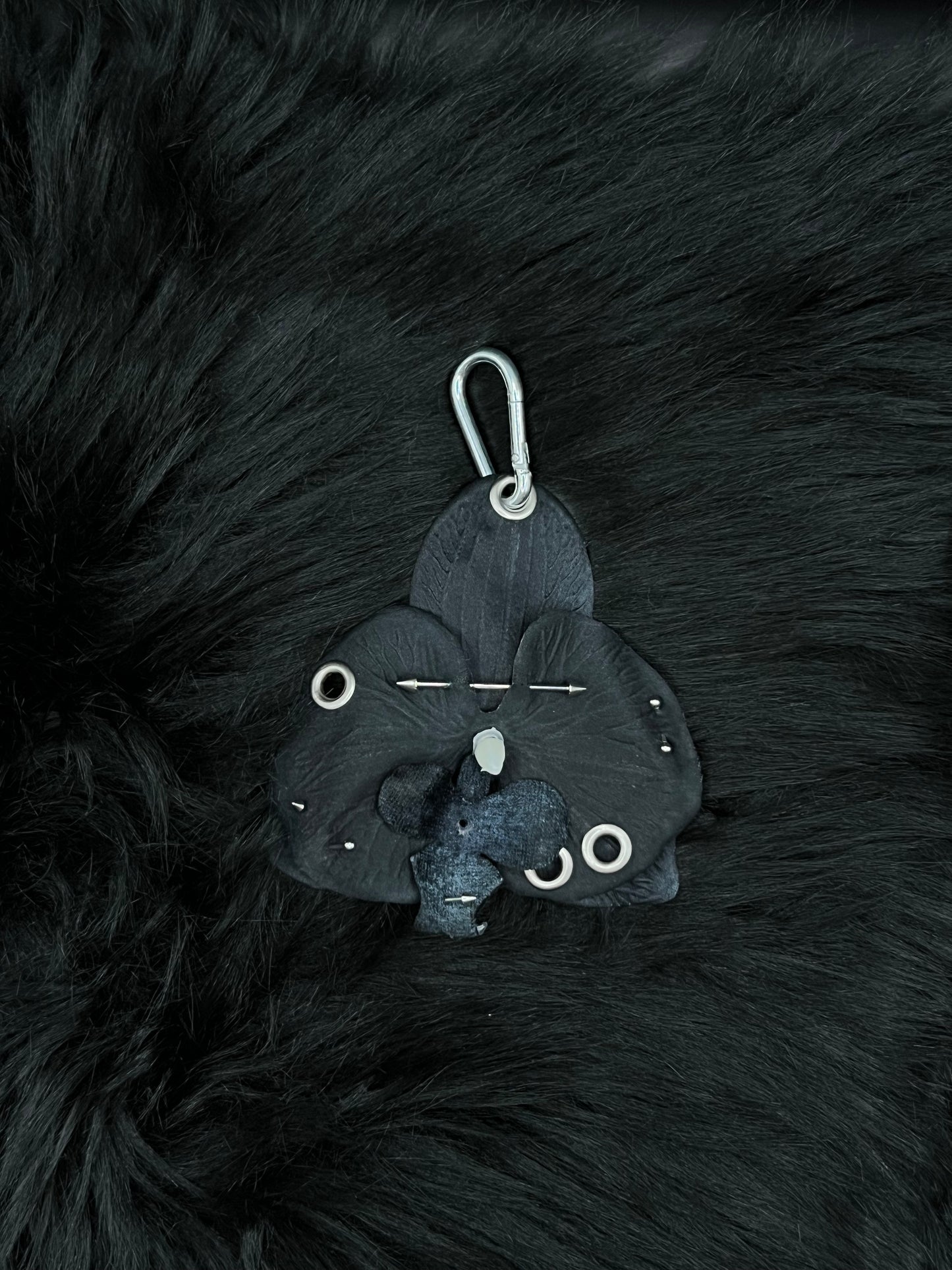 Black Pierced Orchid Keychain With Silver Hardware