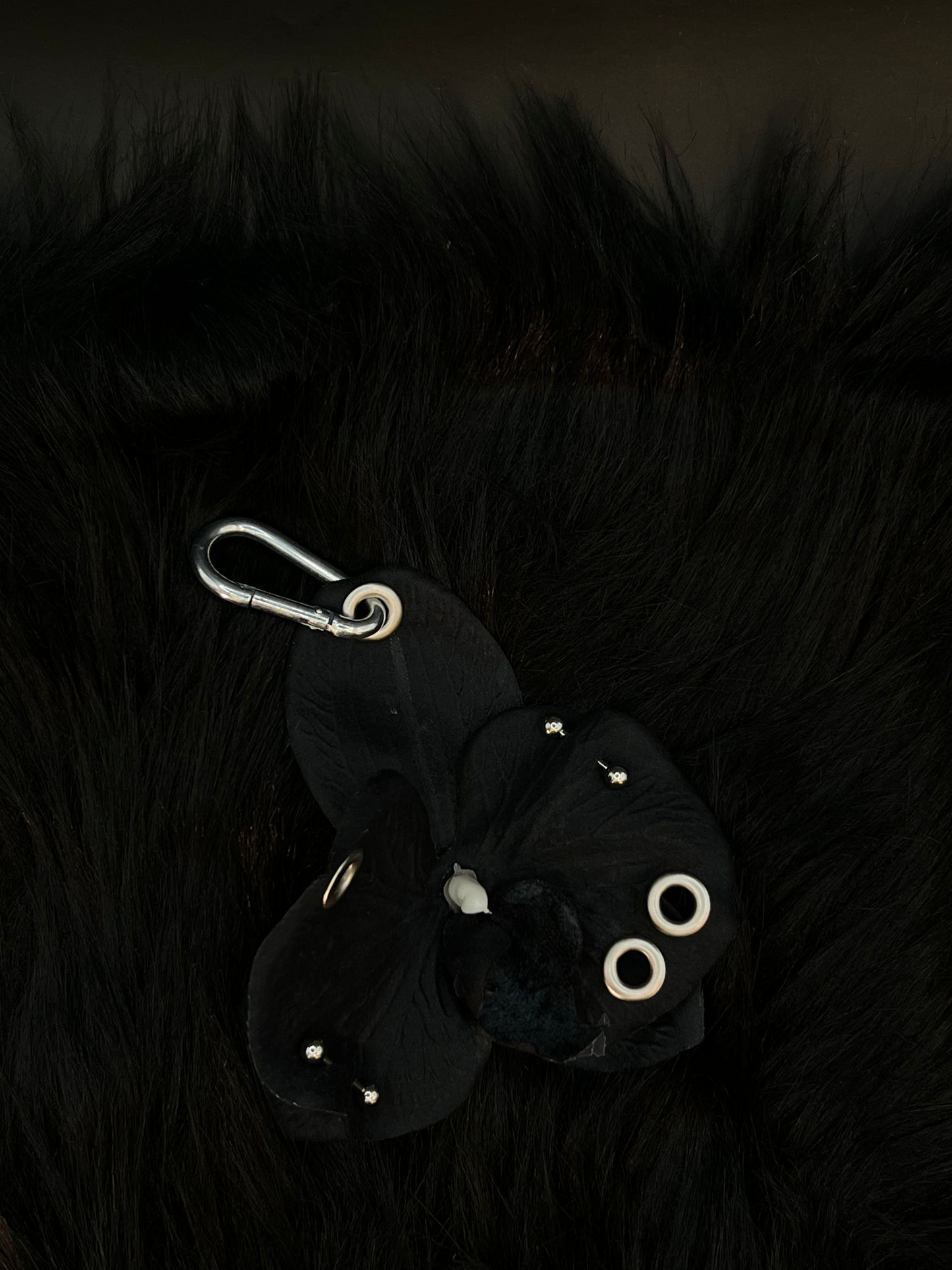Black Pierced Orchid Keychain With Silver Hardware