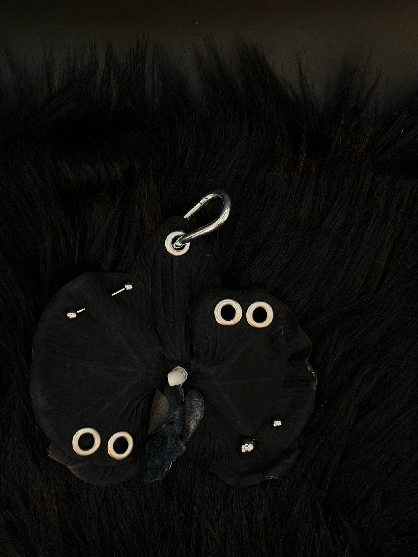 Black Pierced Orchid Keychain With Silver Hardware