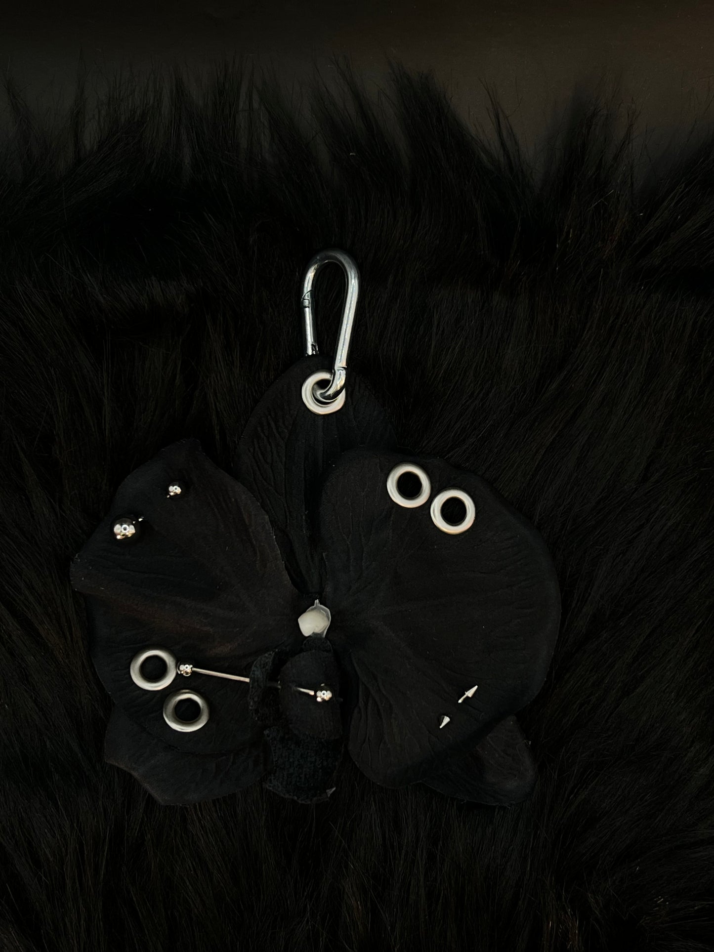 Black Pierced Orchid Keychain With Silver Hardware