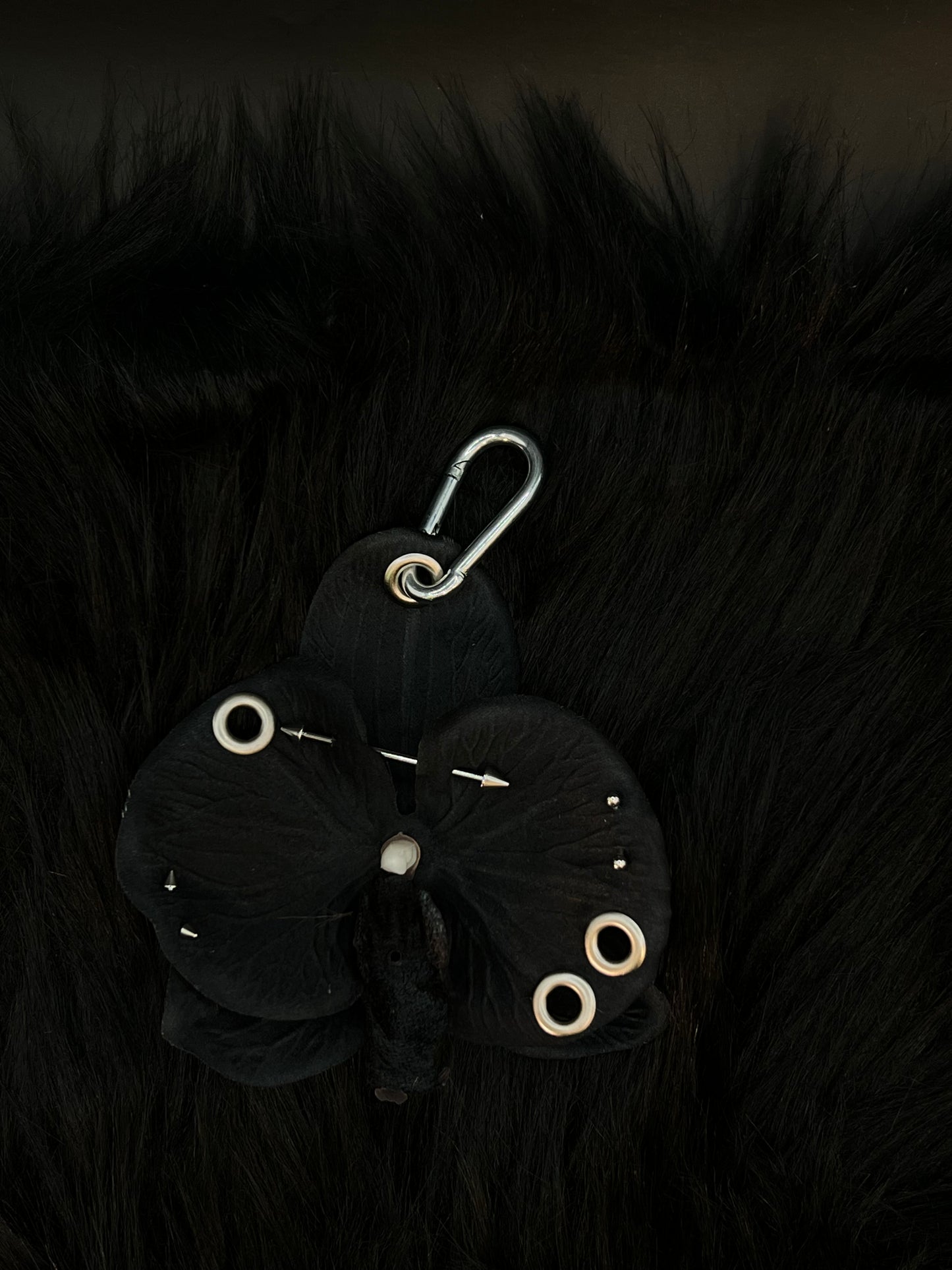 Black Pierced Orchid Keychain With Silver Hardware