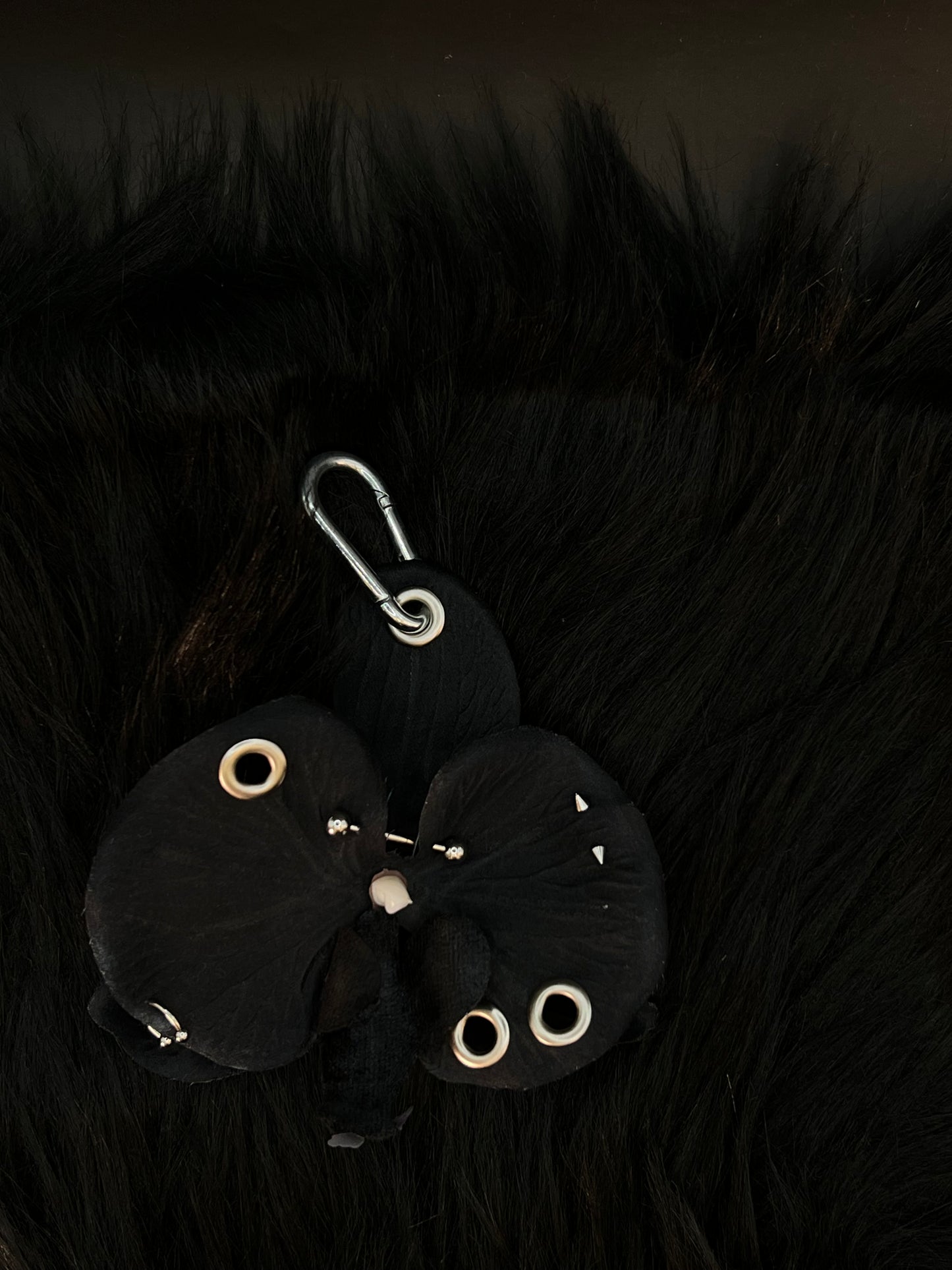 Black Pierced Orchid Keychain With Silver Hardware