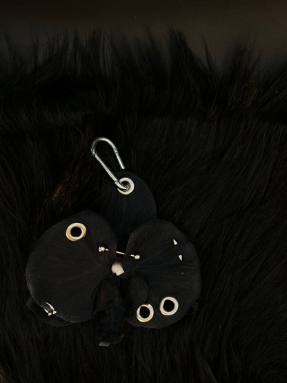 Black Pierced Orchid Keychain With Silver Hardware