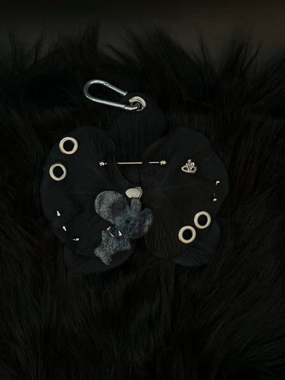 Black Pierced Orchid Keychain With Silver Hardware