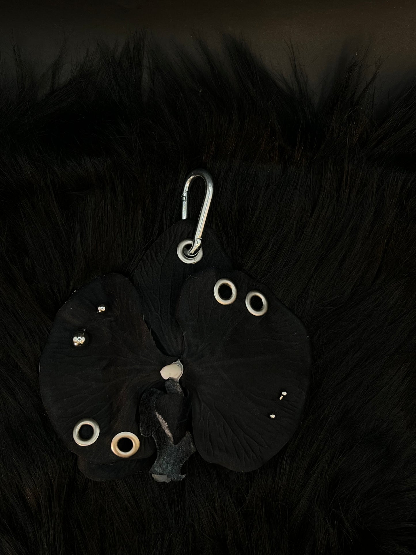 Black Pierced Orchid Keychain With Silver Hardware
