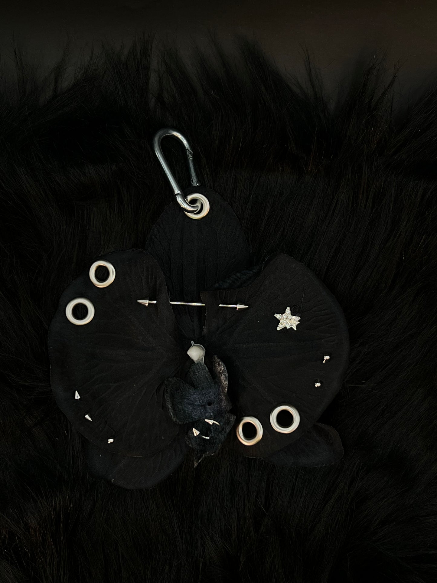 Black Pierced Orchid Keychain With Silver Hardware