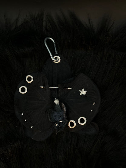 Black Pierced Orchid Keychain With Silver Hardware