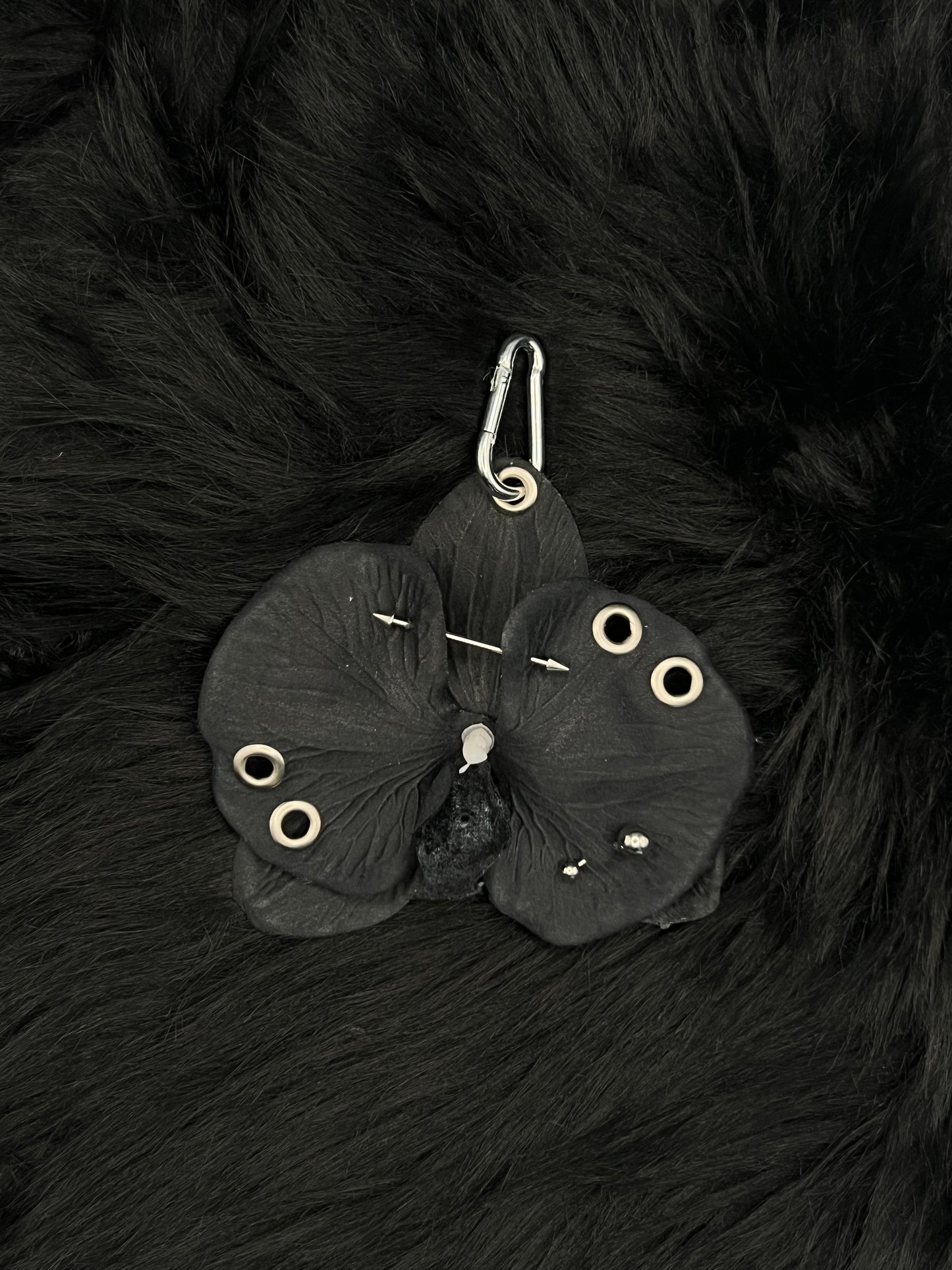 Black Pierced Orchid Keychain With Silver Hardware